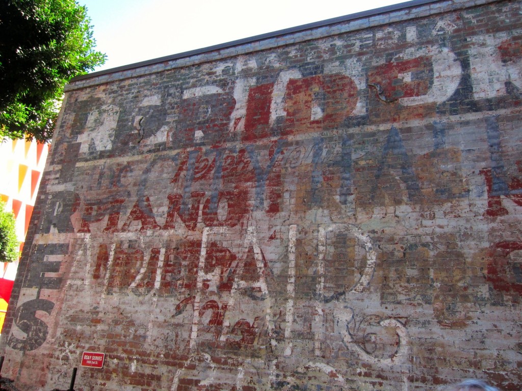 “Ghost writing” on the side of the historic Rapp Saloon in Santa Monica reveals the many uses of the city’s oldest structure, which dates to 1875.
