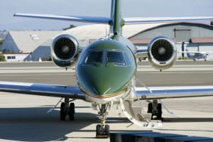 Harrison Ford lands his jet at SMO. Photo via ##http://www.zimbio.com/pictures/wEIOBFZcKVJ/Harrison+Ford+Landing+Private+Jet+Santa+Monica/K4eV5KqaH3n##Zimio.##