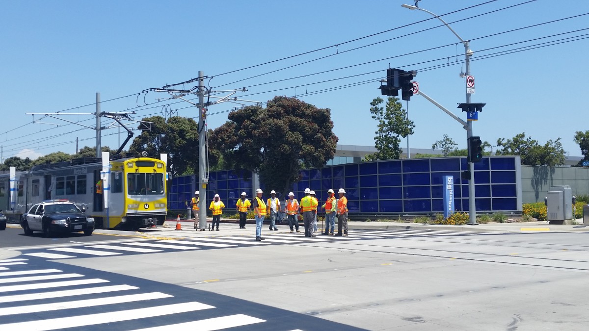 On its way west to 4th Street, the Expo test train passed in front of Santa Monica's Big Blue Bus depot. The municipal transit agency is planning the one of the most comprehensive service realignments in its history to better connect with the Expo line.