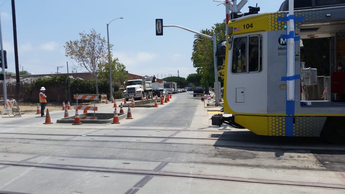 An Expo train moves eastbound across 19th Street. Trains are expected to start testing all the way to 4th Street next week. (Photo by Jason Islas)